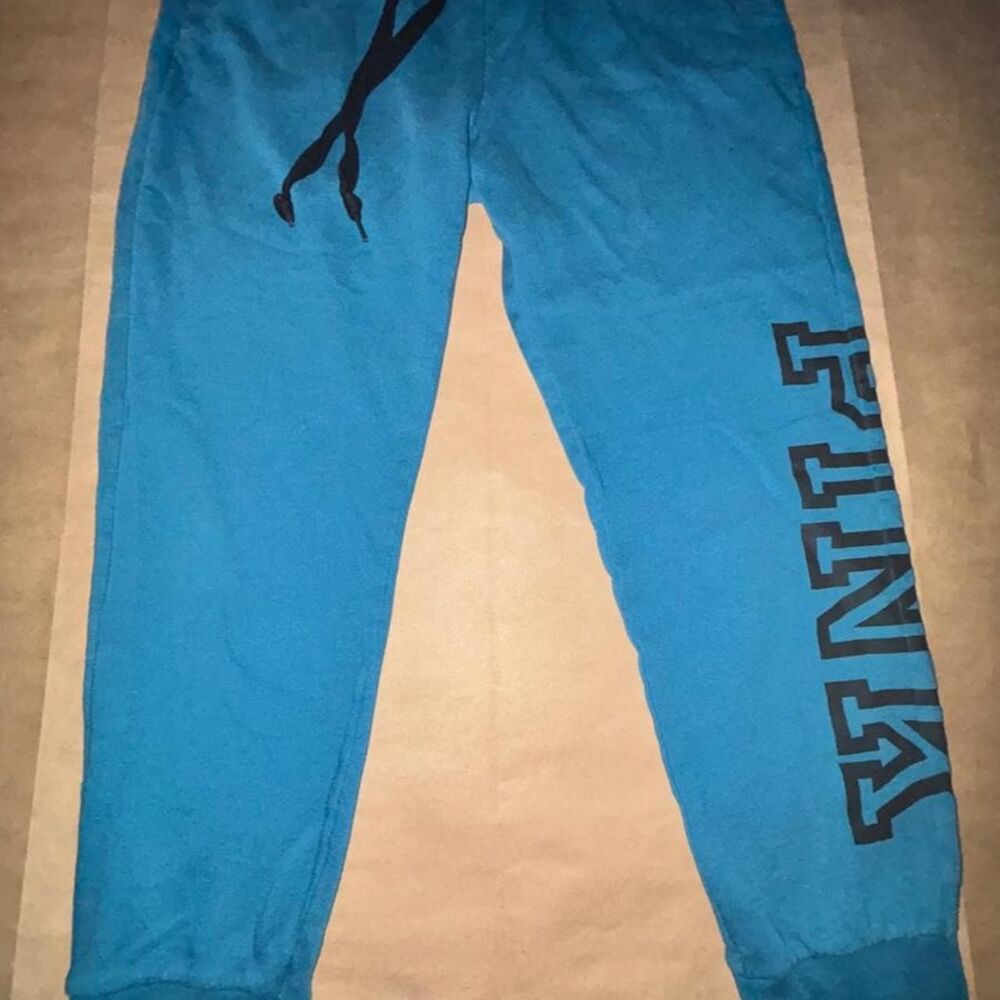 Victoria's Secret PINK teal sweatpants with black text. size M
